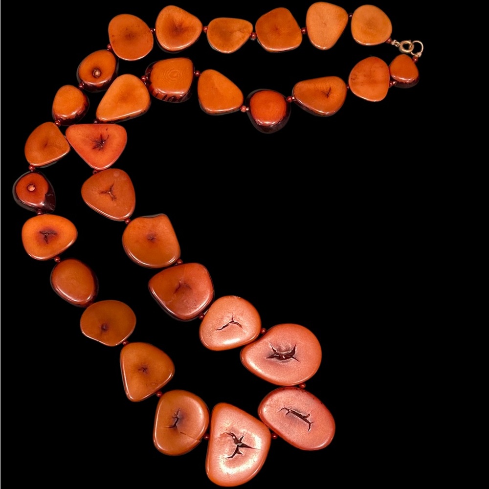 Horn slices necklace. Graduated and polished. Over 40” long.  Antique European